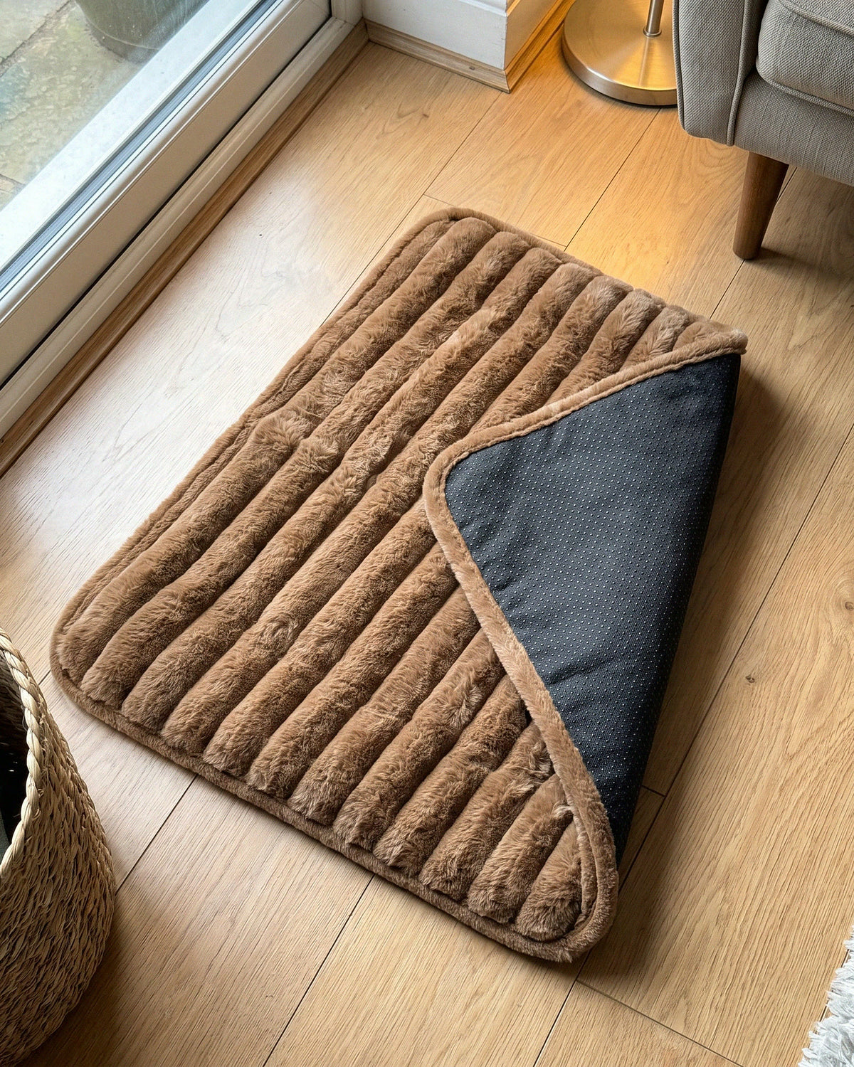 The brown mat laid flat with one corner folded to show the base
